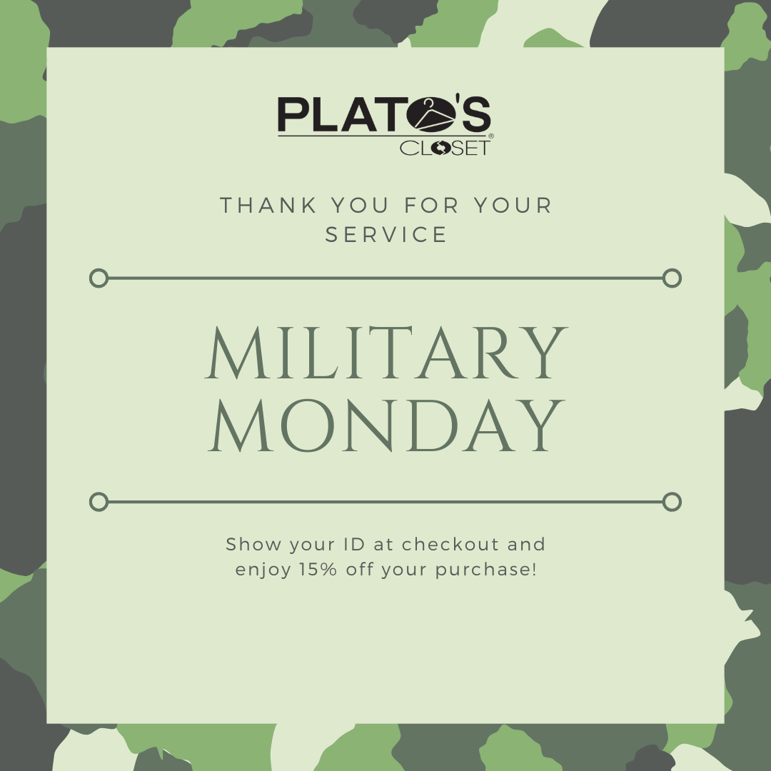 a green sign that says military monday